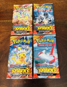 Pokemon TCG S&V Surging Sparks Booster Pack Art Set (4 Pack) NEW & SEALED