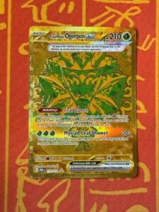 POKEMON TCG TEAL MASK OGERPON EX 177/131 GOLD FULL ART NM PRISMATIC EVOLUTION