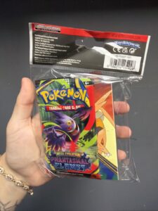 Pokémon TCG Mini Portfolio + Phantasmal Flames Mega Evolution Booster Pack – New