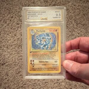 Machamp Base Set 1st Edition Holo Rare #8 (1999) AGS 9.5+, “PSA 10 Equivalent.”