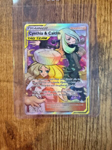 Pokémon Cynthia & Caitlin TAG TEAM Full Art Holo Ultra Rare Trainer 228/236