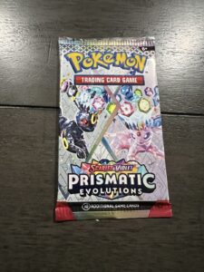 Pokemon TCG Prismatic Evolutions Booster Pack – English – Random Pack Art