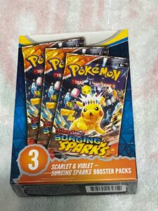 Scarlet & Violet Surging Sparks Booster Pack (3-pack). New. Sealed box.