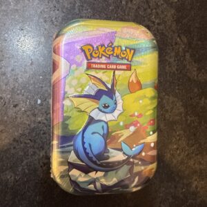📈 Pokémon Prismatic Evolutions Mini Tin Vaporeon Sealed 2-Booster Pack Cards