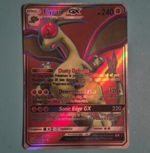 The Pokémon Company Flygon GX 218/236 Cosmic Eclipse Ultra Rare Full Art Holo