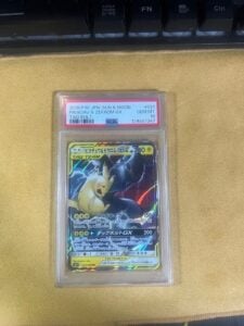 Pikachu & Zekrom GX RR SM12a PSA 10