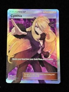 The Pokémon Company Cynthia 148/156 Ultra Prism Full Art Trainer Holo Ultra Rare