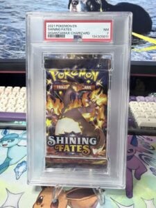 2021 Pokemon Shining Fates Gigantamax Charizard Booster Pack PSA 7 NM Sealed