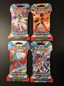 Pokemon Scarlet and Violet Paradox Rift Sleeved Booster Pack Art Set ( 4 packs)
