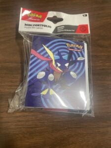 Pokemon TCG Stellar Crown Mini Portfolio SEALED Includes Sealed Booster Pack